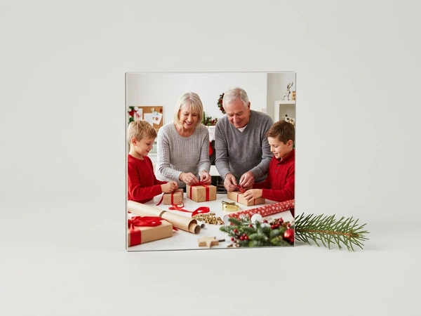 MIXPIX tile of grandparents wrapping gifts with two boys in red sweaters