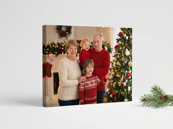 Gallery-wrapped canvas of grandparents and two grandsons by a decorated Christmas tree
