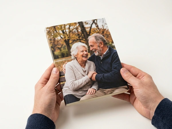 Softcover memorial photo book with an older couple on the cover