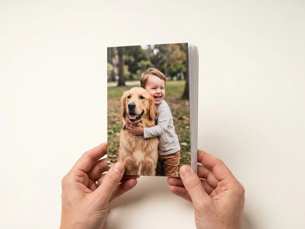6x8 booklet photo book held in two hands