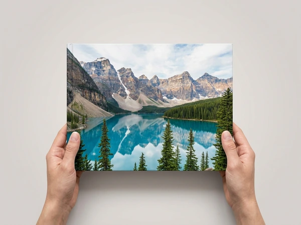 Travel photo book with a mountain lake photo on the cover