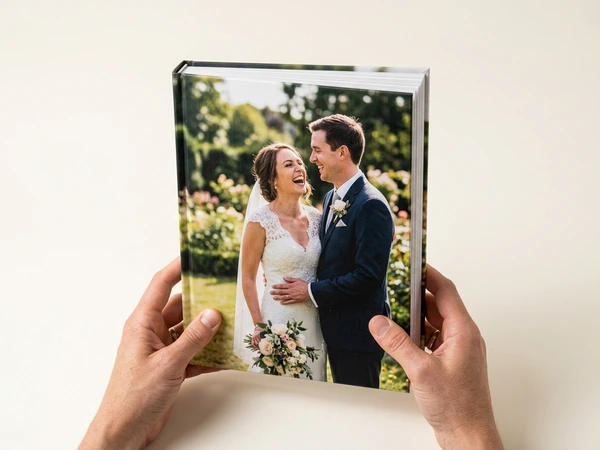 Hardcover wedding photo book with the couple on the cover