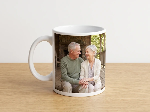 Photo mug printed with a gray-haired couple sitting on a porch bench