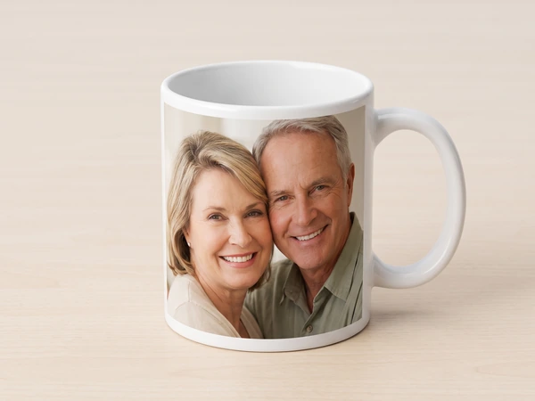 Photo mug printed with a close-up of a smiling middle-aged couple