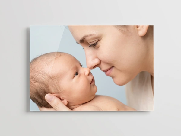 Acrylic print of a mother touching noses with her newborn