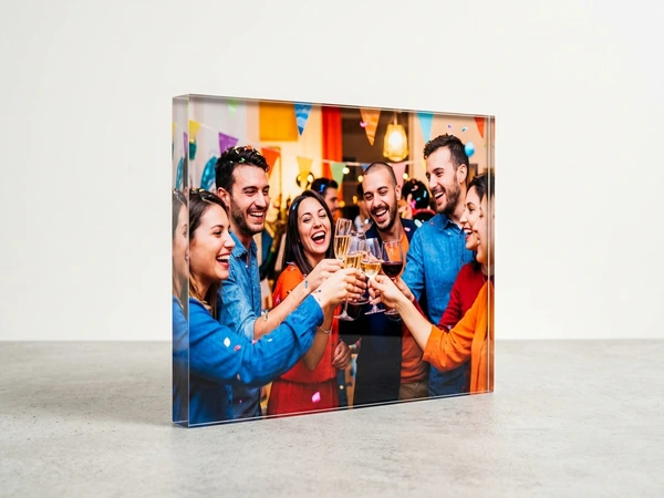 Acrylic photo of friends raising glasses of wine under colorful party bunting
