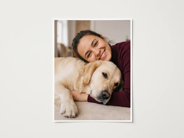 Poster of a smiling woman hugging a sleeping golden retriever