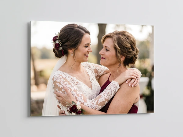 Acrylic print at an angle of a bride hugging her mother