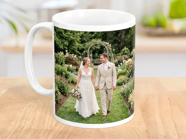 Photo mug printed with a couple walking hand in hand through a garden