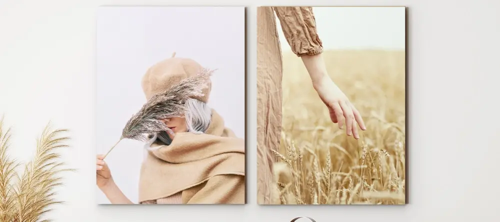 How to decorate for fall: two matching prints in light autumnal colors displayed on the wall