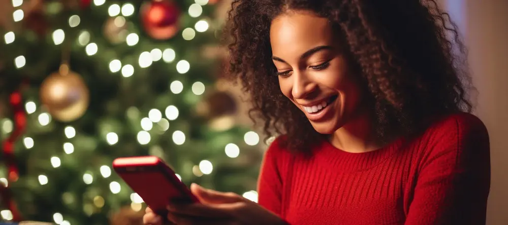 How much to spend on Christmas gifts per person: a woman calculating festive budget
