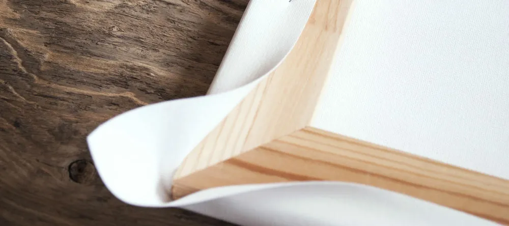 What is rolled canvas print. Stretched canvas frame close up.