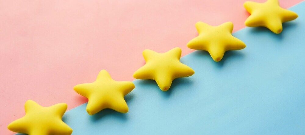 Where to Buy Canvas Prints in the US. Row of five stylized gold stars.