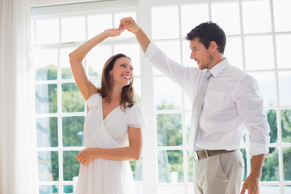 Couple taking dance lessons together as a Valentine's Day experience gift