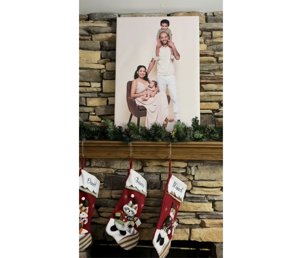 Family photo canvas print over fireplace