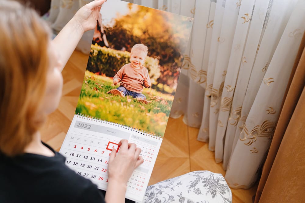 Personalized photo calendar with family pictures as a Mother’s Day gift for grandma