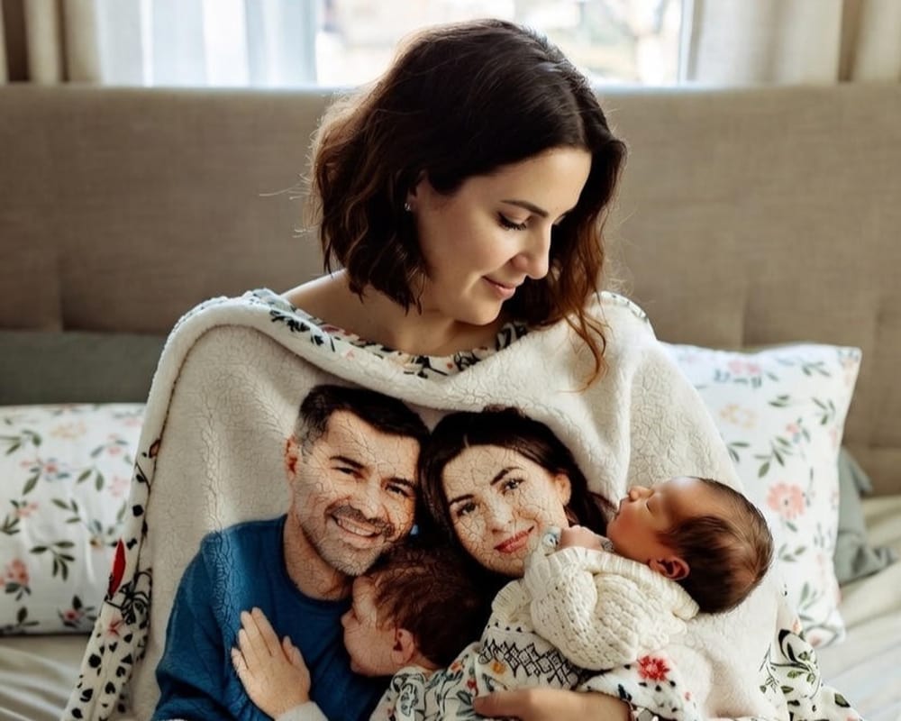 Personalized photo blanket for late-night feedings as a first Mother's Day gift for new moms