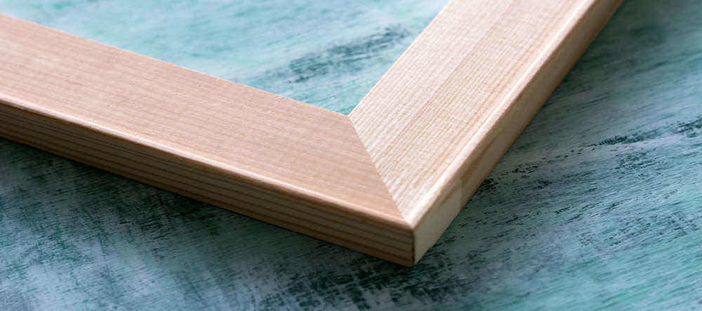 Do cheap canvas prints mean bad canvas prints. Wooden canvas print edge close-up.