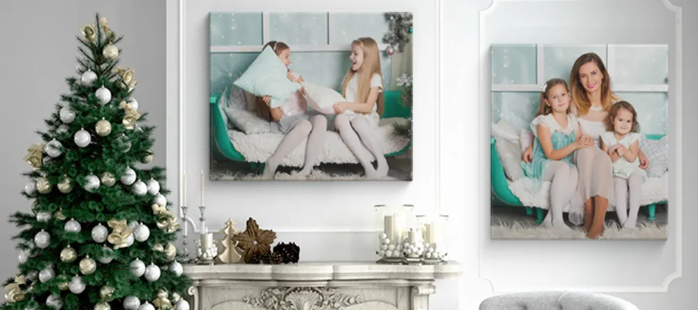 Christmas canvas prints. Christmas canvas prints on wall with Christmas tree next to them.