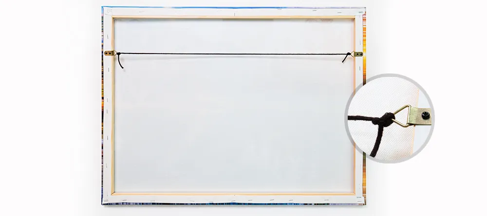 How to hang canvas prints. Back of large-format canvas print with cord.