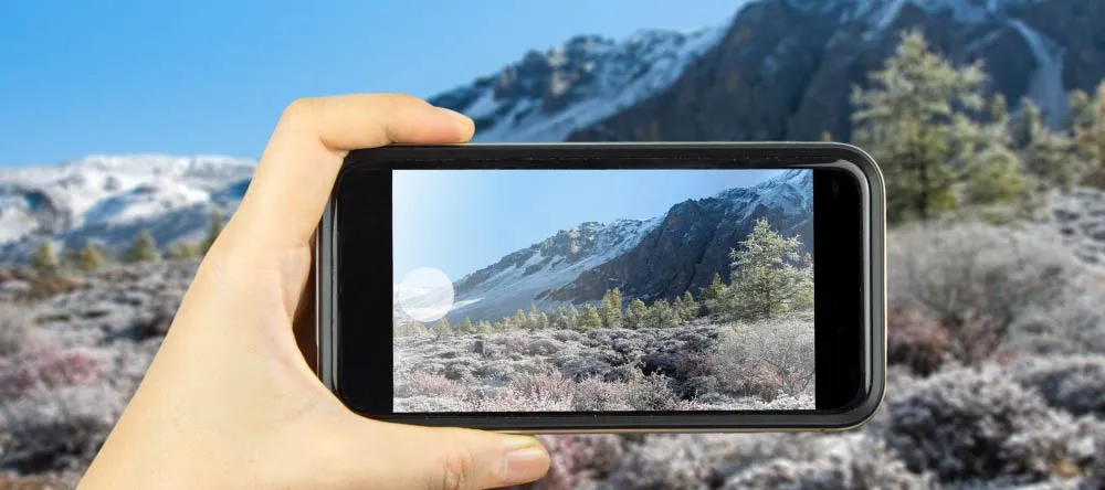 10 Common Myths About Personalized Canvas Prints: Part II. Person taking photo with cell phone.