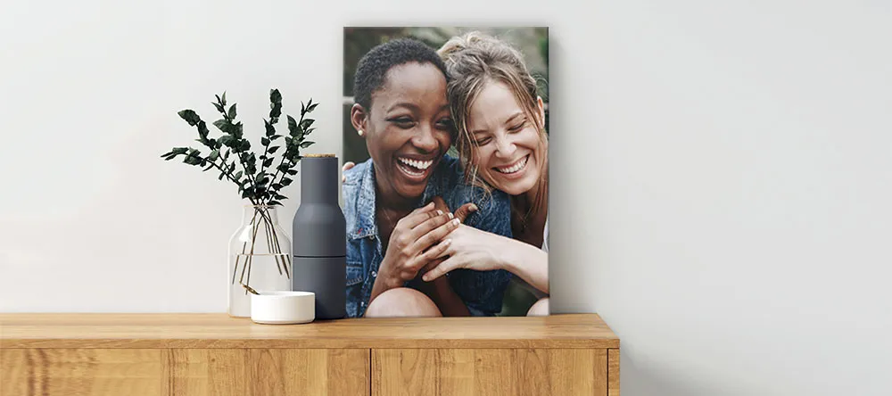 Canvas vs metal print: a canvas print leaned against the wall