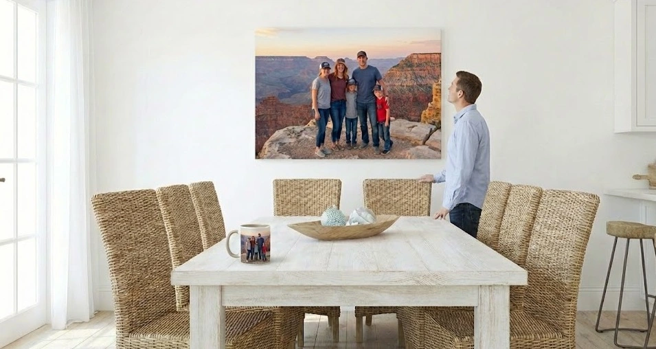 Panoramic travel photography canvas print featuring a canyon landscape, displayed in a bright dining room with a matching personalized photo mug on the table