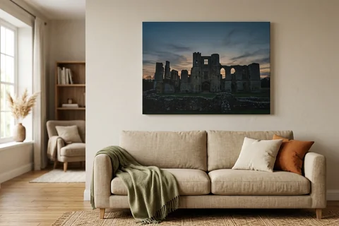 canvas print basingstoke – a gallery-wrapped canvas print of Basing House ruins at dusk hung above a sofa