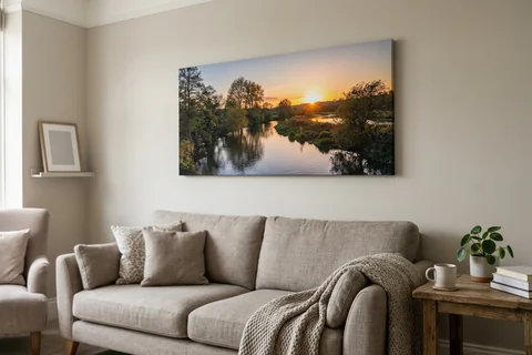 panoramic canvas print basingstoke – a wide panoramic canvas of the River Loddon at sunset hung above a long sofa