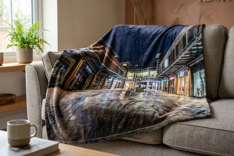 photo blanket basingstoke – a plush blanket printed edge to edge with the Malls at night draped over a sofa