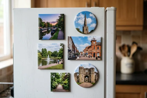 mixmags photo magnets basingstoke – several photo magnets of Basingstoke landmarks in different shapes on a fridge door