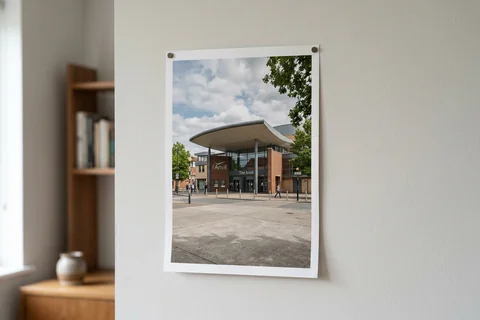 poster print basingstoke – an unframed poster print of the Anvil concert hall pinned to a pale wall