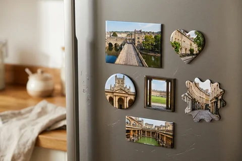 mixmags photo magnets bath – several photo magnets of Bath landmarks in different shapes on a fridge door