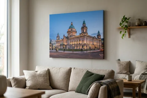 canvas print belfast – a gallery-wrapped canvas print of Belfast City Hall at dusk hung above a sofa