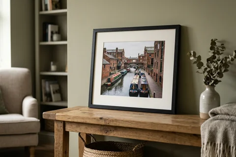 framed photo print birmingham – a framed print of Gas Street Basin with a white mount and black frame standing on a console table