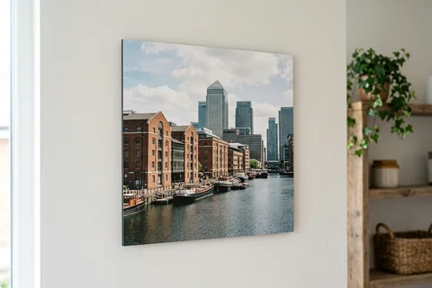 photo board print canary wharf – a frameless matte photo board of the Museum of London Docklands hanging flush on a pale wall