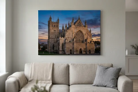canvas print exeter – a gallery-wrapped canvas print of Exeter Cathedral at dusk hung above a sofa