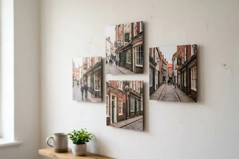 mixpix photo tiles hull – four 20×20 cm photo tiles of the Land of Green Ginger arranged in a cluster on a white wall with no visible fixings