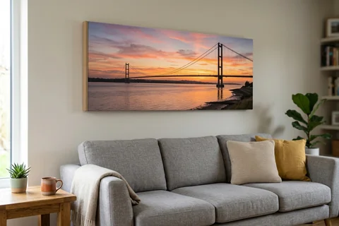 panoramic canvas print hull – a wide panoramic canvas of the Humber at sunset hung above a long sofa