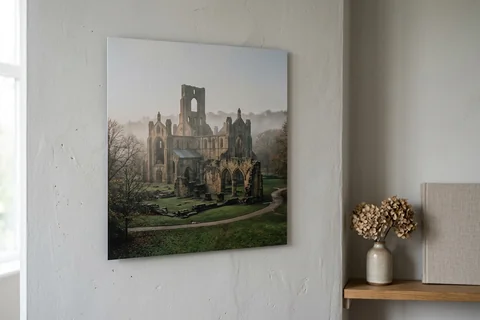 aluminium photo print leeds – a matte aluminium panel print of Kirkstall Abbey in morning mist mounted flush on a grey wall