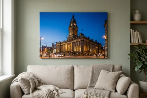 canvas print leeds – a gallery-wrapped canvas print of Leeds Town Hall at dusk hung above a sofa