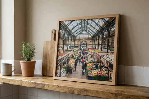 framed photo board leeds – a slim-framed photo board of Kirkgate Market stalls standing on a kitchen shelf