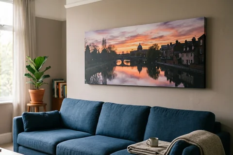 panoramic canvas print leicester – a wide panoramic canvas of the River Soar at sunset hung above a long sofa