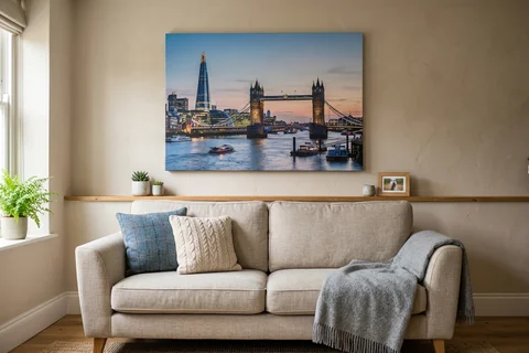 canvas print london – a gallery-wrapped canvas print of Tower Bridge at dusk hung above a sofa