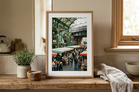 framed photo board london – a slim-framed photo board of Borough Market awnings standing on a kitchen shelf