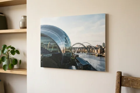 photo board print newcastle – a frameless matte photo board of the Sage Gateshead hanging flush on a pale wall