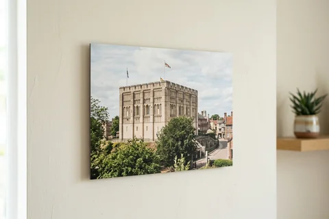 photo board print norwich – a frameless matte photo board of Norwich Castle hanging flush on a pale wall