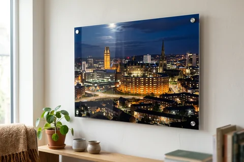 acrylic photo print sheffield – a glossy acrylic print of the city skyline at night mounted off a pale wall