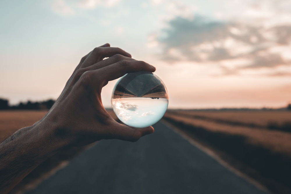 Glass ball in the hand