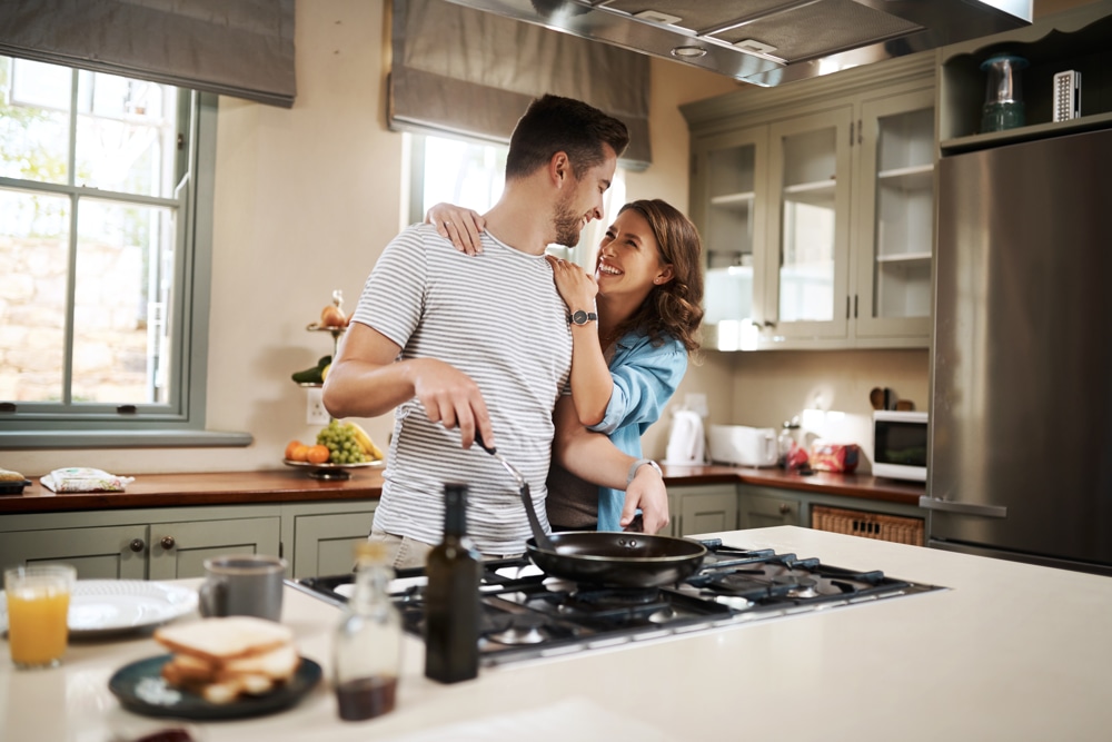 Couple cooking together at home as a Valentine’s Day experience gift